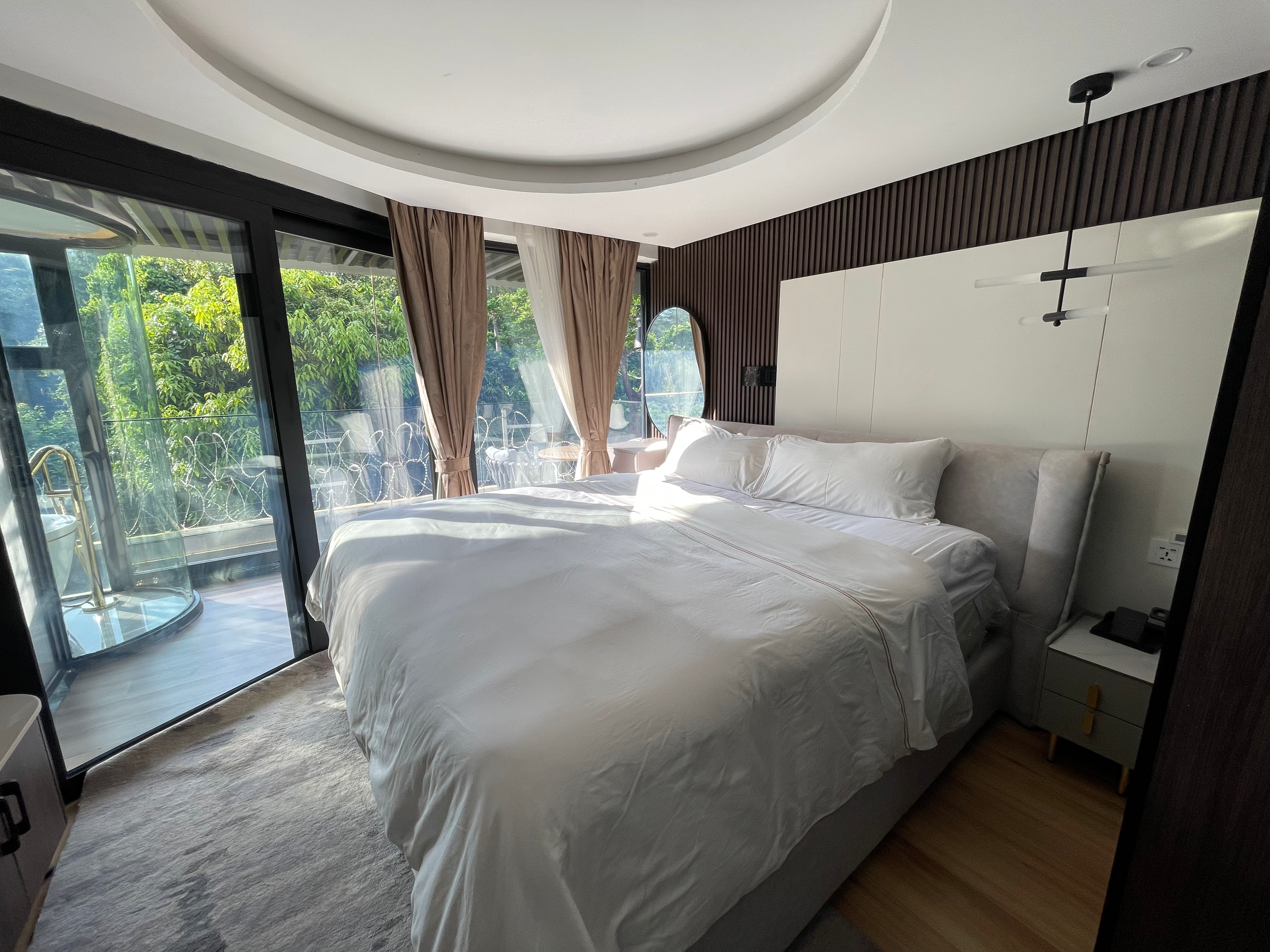 Clean modern bedroom angle showing designer finishes