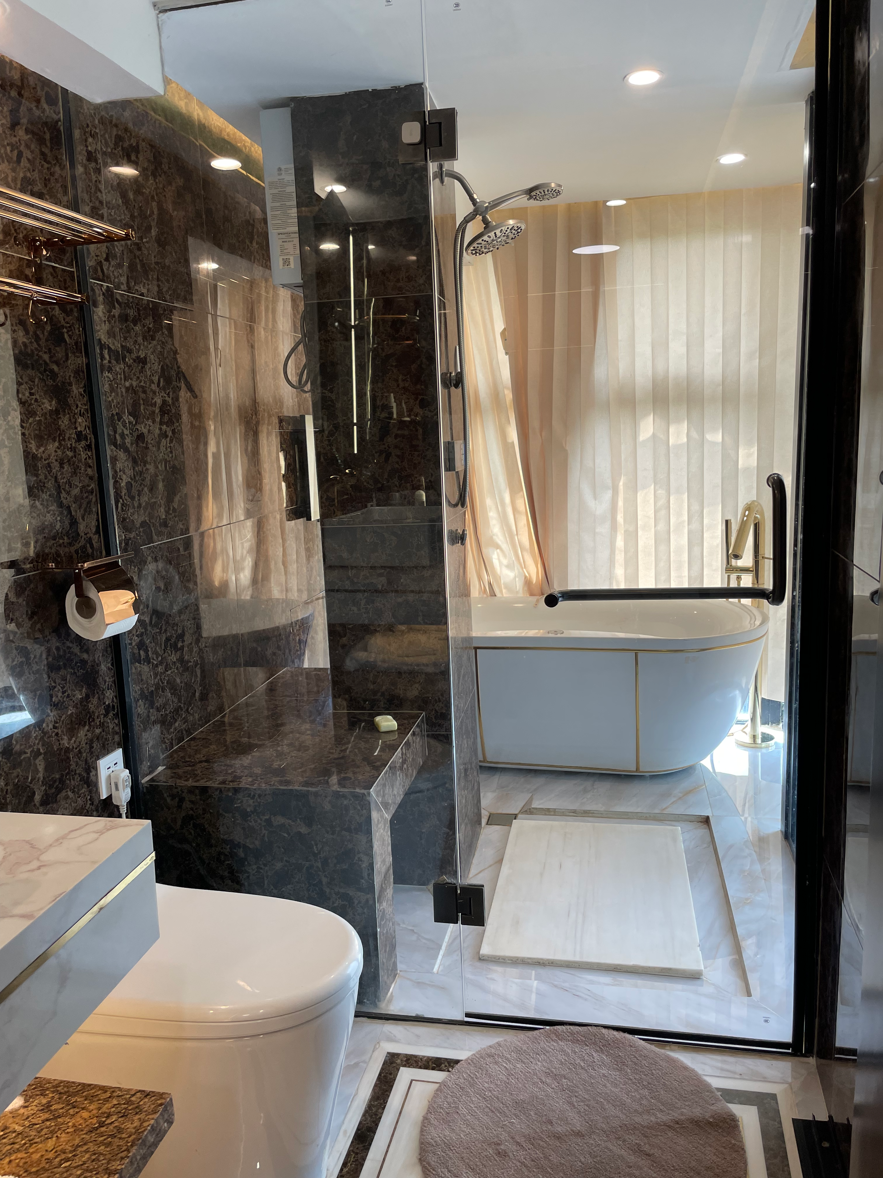 Complete bathroom layout showing shower, tub, and toilet